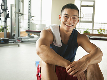 Man smiling in the gym