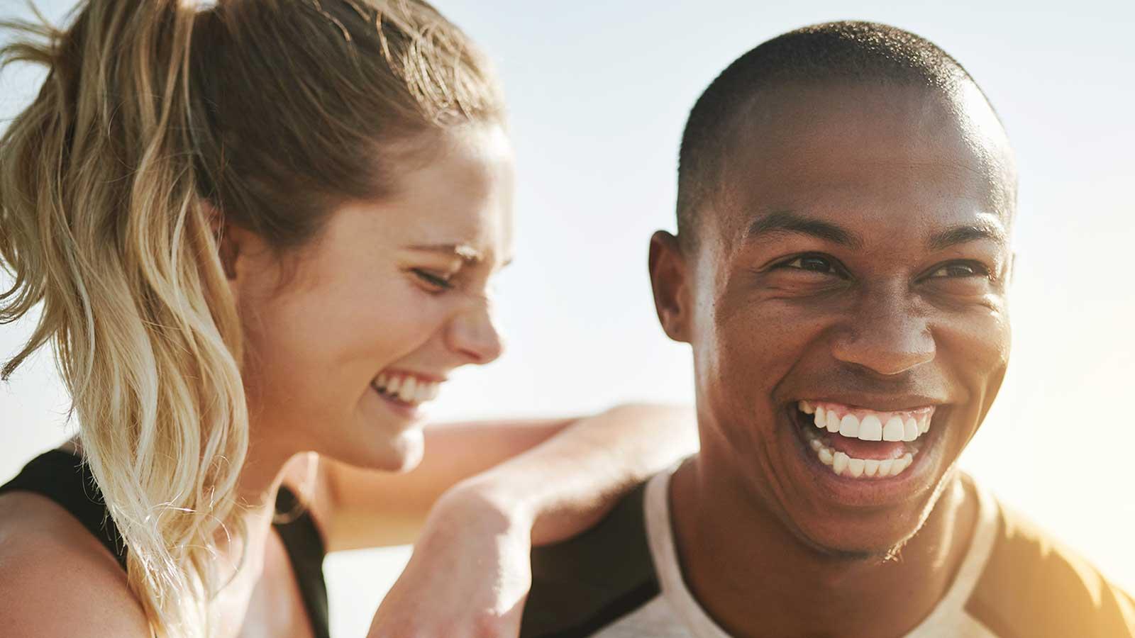 Man and woman laughing together