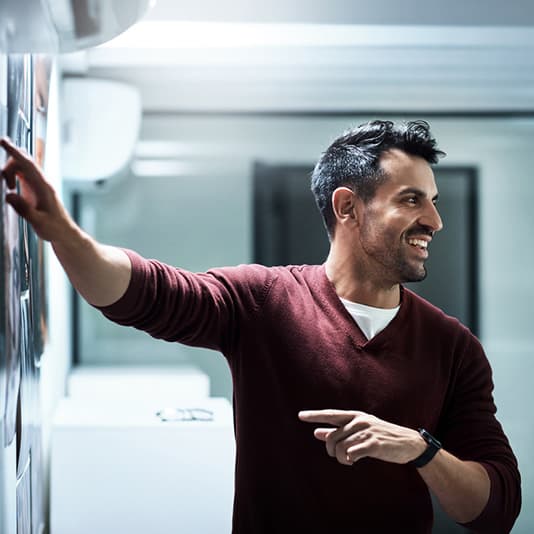 Man pointing at a whiteboard