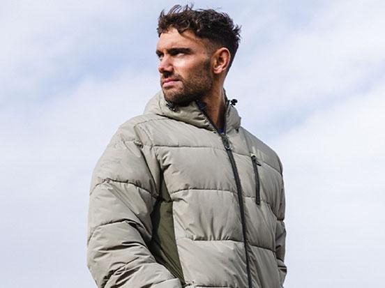 Man wearing Trespass puffer coat